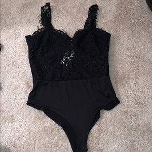 New with tags body suit/lingerie women’s